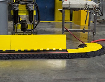 Cable protector with cables